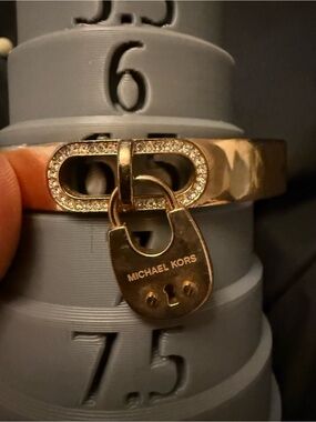 Michael Kors Gold tone Padlock Bangle with Crystal Accents